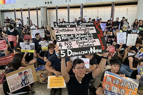 China backs Lam, Hong Kong police, calls on HK people to oppose violence