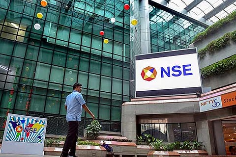 Sensex slips over 150 points amid trade war fears