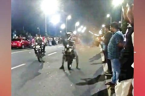 The youth seen doing stunts on their bikes on Kamarajar Salai