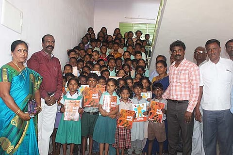 Tiruvannamalai CEO Jayakumar with students who joined government schools from private schools at Kannamangalam