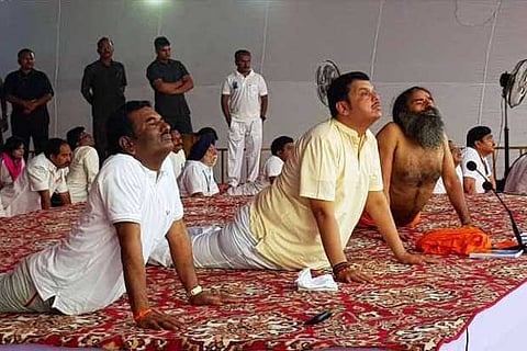 Fadnavis, Ramdev lead Yoga Day celebrations in Maharashtra