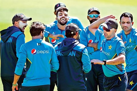Pakistan players share a lighter moment on the eve of the clash against South Africa