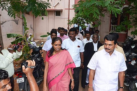 Karur MP S Jothimani and Aravakurichi MLA V Senthil Balaji coming out of the court in Karur on Tuesday