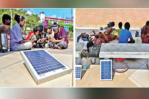 Solar panels being used on Marina beach; panels being charged in the sun