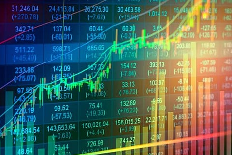 US stocks trade higher amid Fed chair's stress on patience