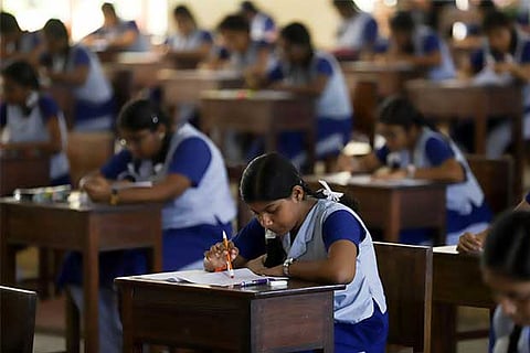 Class XI students attending their first language paper under new syllabus in Chennai on Wednesday