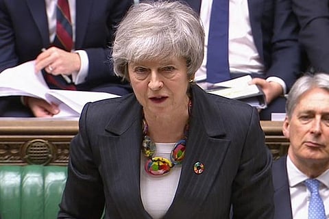 May, EU's Juncker agree 'legally binding' changes to Brexit deal