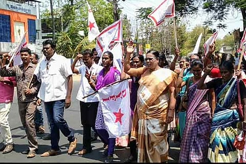 Members of the Democratic Youth Federation of India (DYFI) take out a rally in Tiruchy, pressing for action
