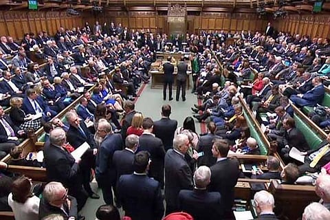 UK MPs vote to delay Brexit Day, but reject second referendum