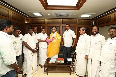 AIADMK former minister Raja Kannappan greets DMK president MK Stalin at Anna Arivalayam, in Chennai on Monday