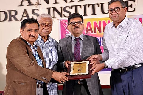Anna University Vice-Chancellor M K Surappa hands over the outstanding alumnus award to S Narayanan (right)