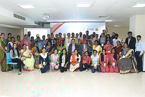 Delegates, along with other participants at the discussion, at Gateway International School