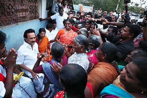 M K Stalin interacts with villagers during his poll tour in Ottapidaram Assembly constituency