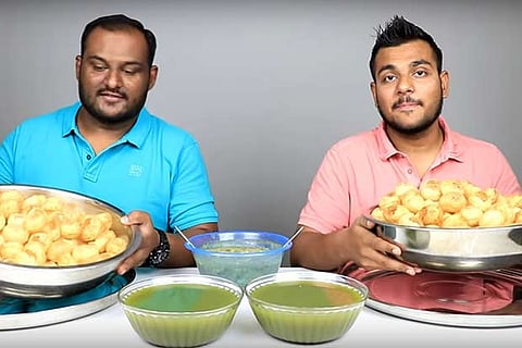 Vishwa and Akash Joshi eating 300 pani puris