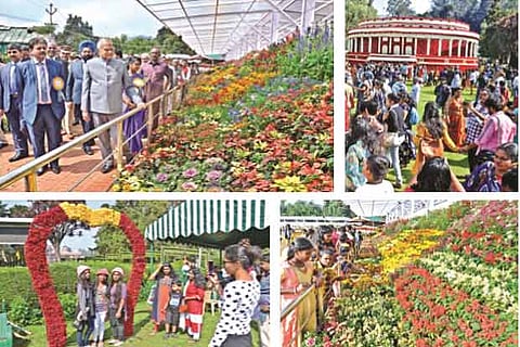 Governor looks at the exhibits after inaugurating the annual flower show at Government Botanical Garden