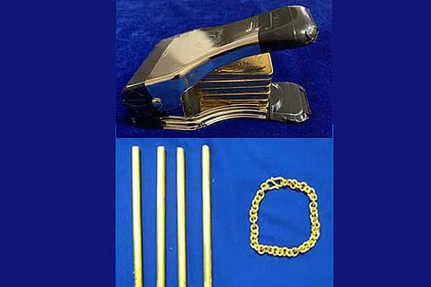 Gold concealed inside SIM card cutter (top); gold  hidden inside pasta maker