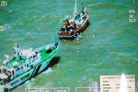Indian Coast Guard ship apprehends a Pakistani fishing boat inside Indian waters off Gujarat coast
