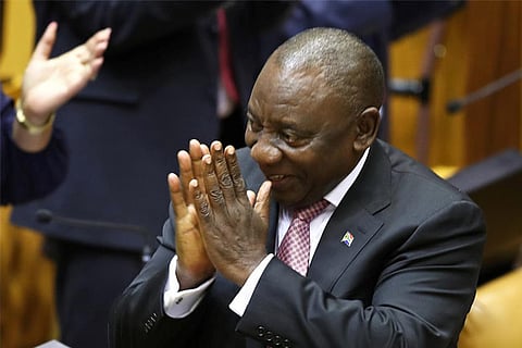 Re-elected South African President Cyril Ramaphosa acknowledges applause