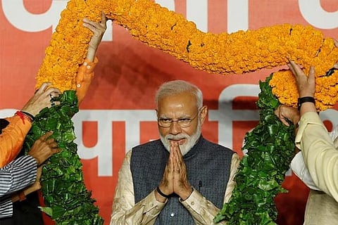 Modi begins talks for new cabinet after big election win