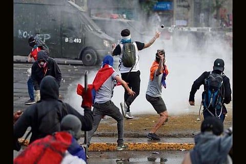 Mega-rally marks Chile protests third week as president struggles