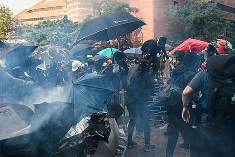 Hong Kong siege turns campus into scorched battleground