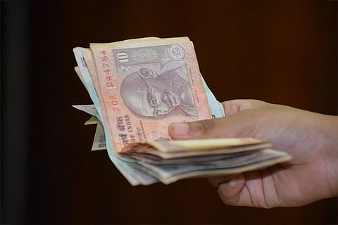 Rupee slips 8 paise to 71.89 against USD in early trade