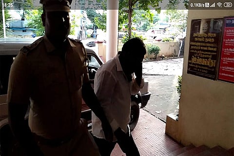 One of the accused being brought to the Tambaram police station after he was nabbed by a special team