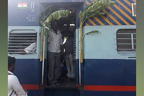 The decorated coach of Yelagiri Express in which the passengers from Sholinghur celebrated ayudha pooja