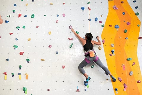 Indoor rock climbing, an exercise for both mind and body