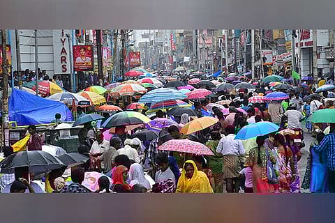 Shoppers in a festive spirit walking down the South Masi street in Madurai on Saturday