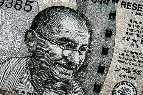 Rupee gains 18 paise against US dollar in early trade