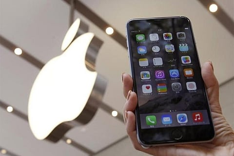 Despite iPhone decline, Apple logs record quarter
