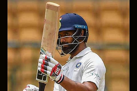 Vihari's ton, Ishant' fifty guide India to 416 all out