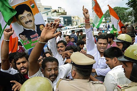 Congress members raise slogans against the central government for the arrest of DK Shivakumar | PTI
