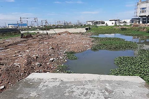Construction materials disposed block the flow of water