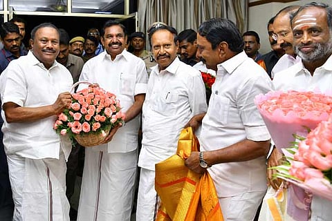 Ministers and party functionaries welcome Edappadi K Palaniswami on his return on Tuesday