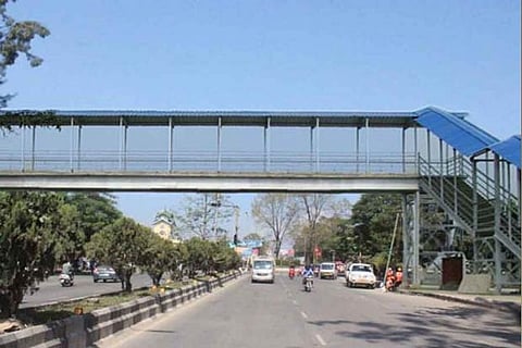 Corpn plans foot over bridge near station on Nelson Manickam Road