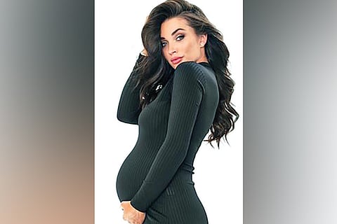 Amy Jackson flaunts baby bump in maternity shoot