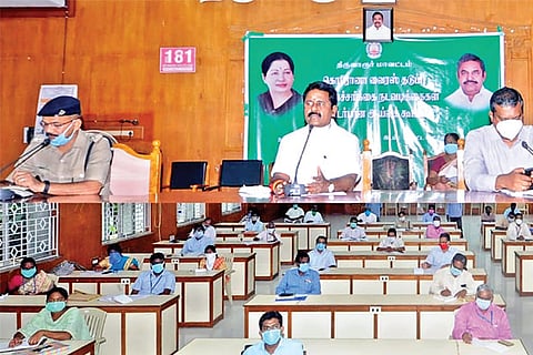 Food Minister R Kamaraj chairing a review meeting in Tiruvarur on Friday