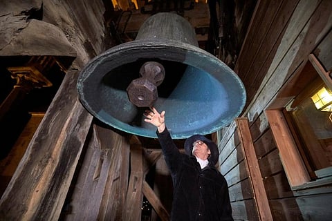 Lausanne watchman rings cathedral bell anew to signal hope amid pandemic
