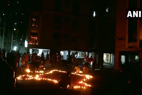 Indians respond to PM's appeal, light candles, diyas, turn on mobile phone torches