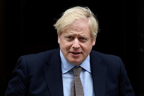 UK PM Johnson stable after second night in intensive care battling COVID-19