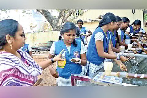 Students of Lady Sivaswamy Ayyar Girls? Higher Secondary School, Mylapore, washing hands(File photo)
