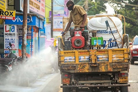 A worker sprays disinfectant in the wake of deadly coronavirus in Tamil Nadu