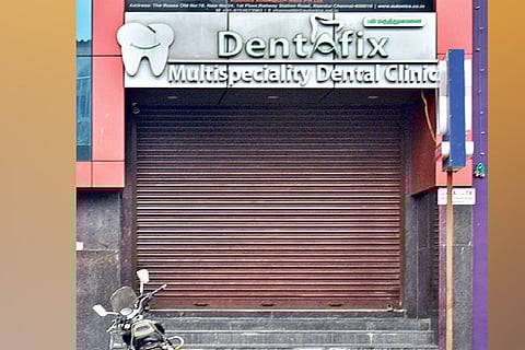 Shutters closed at a dental clinic in city