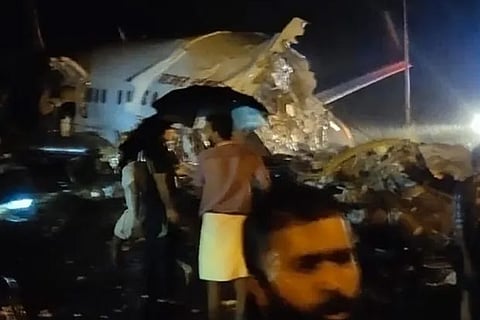 Air India Express flight from Dubai to Calicut with over 190 passengers breaks into two after skidding off runway