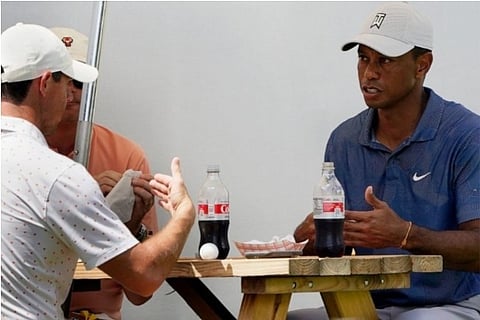 Just like us: Tiger and Rory play 18 and then grab a burger
