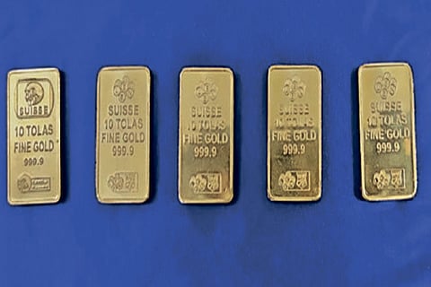 Gold worth Rs 36.8L seized from 3 at airport