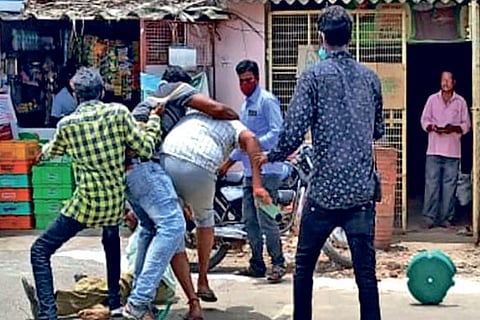 Members of the public trying to break the fight