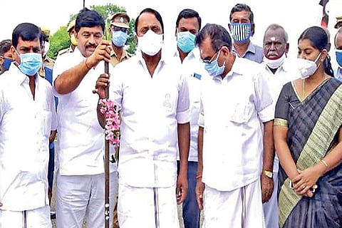 School Education Minister KA Sengottaiyan attends a bhoomi puja to lay new roads in Erode district